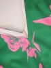 Wizytowa zielona sukienka maxi rozkloszowana w kwiaty – wysmuklający dekolt w serek i kontrafałdy 39323