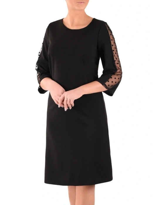Elegancka sukienka trapezowa w groszki czarna – kobiecy krój tuszujący niedoskonałości 36890