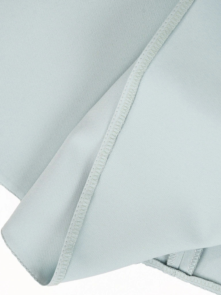 Rozkloszowana sukienka midi w kolorze miętowym na wesele – pionowe zaszewki smuklące sylwetkę 41485
