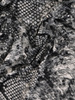Dzianinowa sukienka z kopertowym dekoltem, kreacja w zwierzęcym wzorze 27992