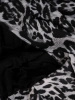 Elegancka sukienka trapezowa w modny zwierzęcy print – tuszujący fason z asymetrycznym dołem i falbaną 19542