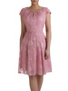 Rozkloszowana sukienka w koła Pilar, różowa kreacja z tkaniny.	