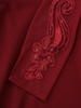 Rozkloszowana sukienka ozdobiona cekinami 14434, kreacja z koronkowym topem.