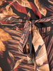 Elegancka sukienka maxi, kreacja z ozdobnymi rozcięciami na rękawach 34520