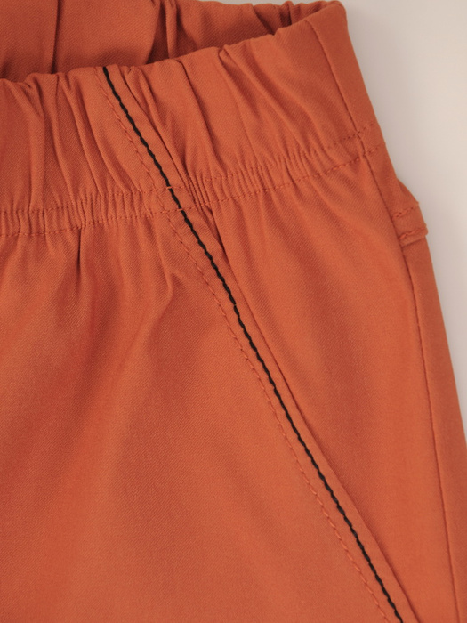 Pomarańczowe spodnie damskie z gumą w pasie 34884
