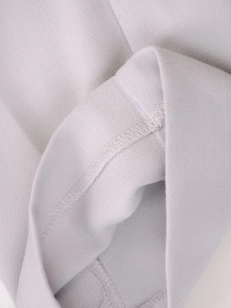 Eleganckie szare spodnie damskie o prostym kroju na gumce – komfortowy model z ozdobnymi guzikami 35404