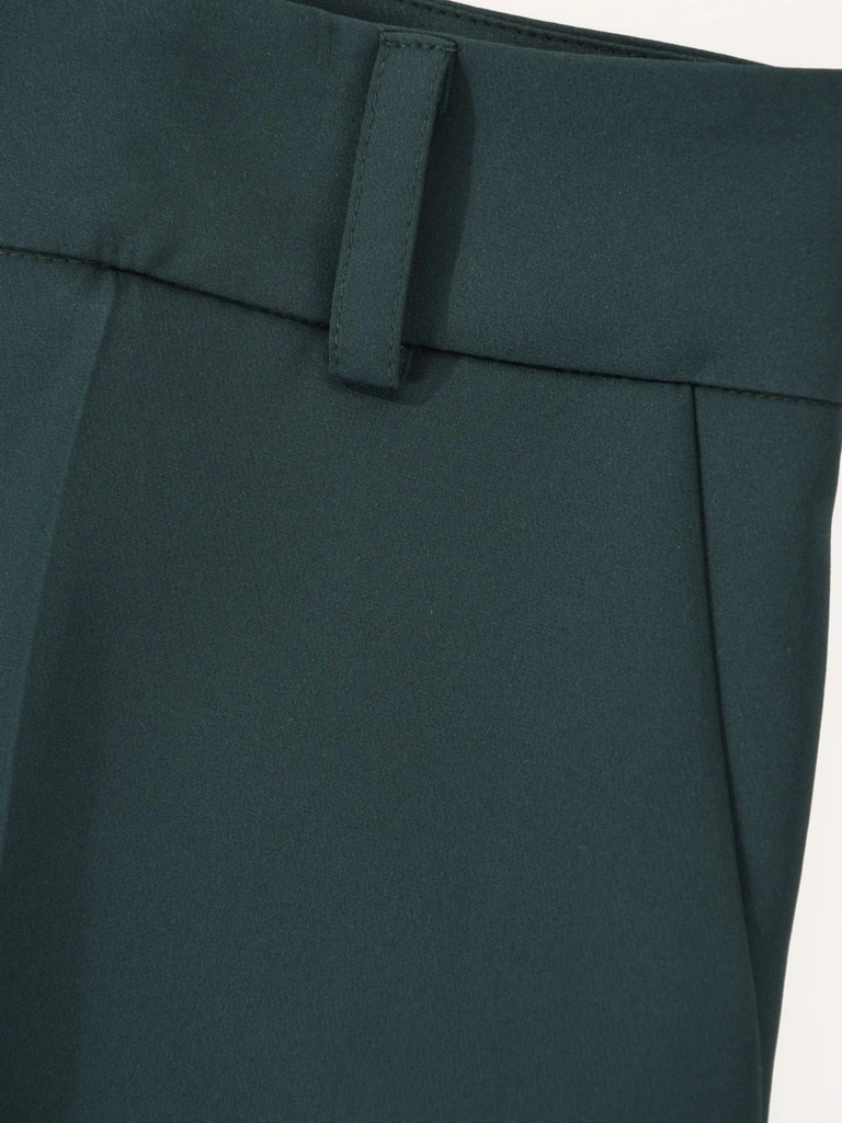 Eleganckie spodnie damskie dzwony butelkowa zieleń – wysmuklający fason z kieszeniami do pracy 41959