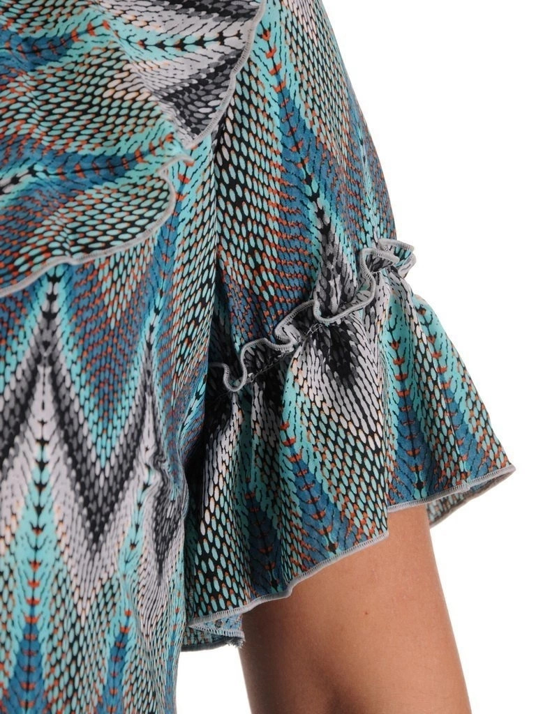 Elegancka sukienka rozkloszowana w modny wzór – wysmuklający fason midi na jesień 26159